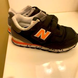 Toddler New Balance Shoes size 9 in fair condition has some wear but no holes
